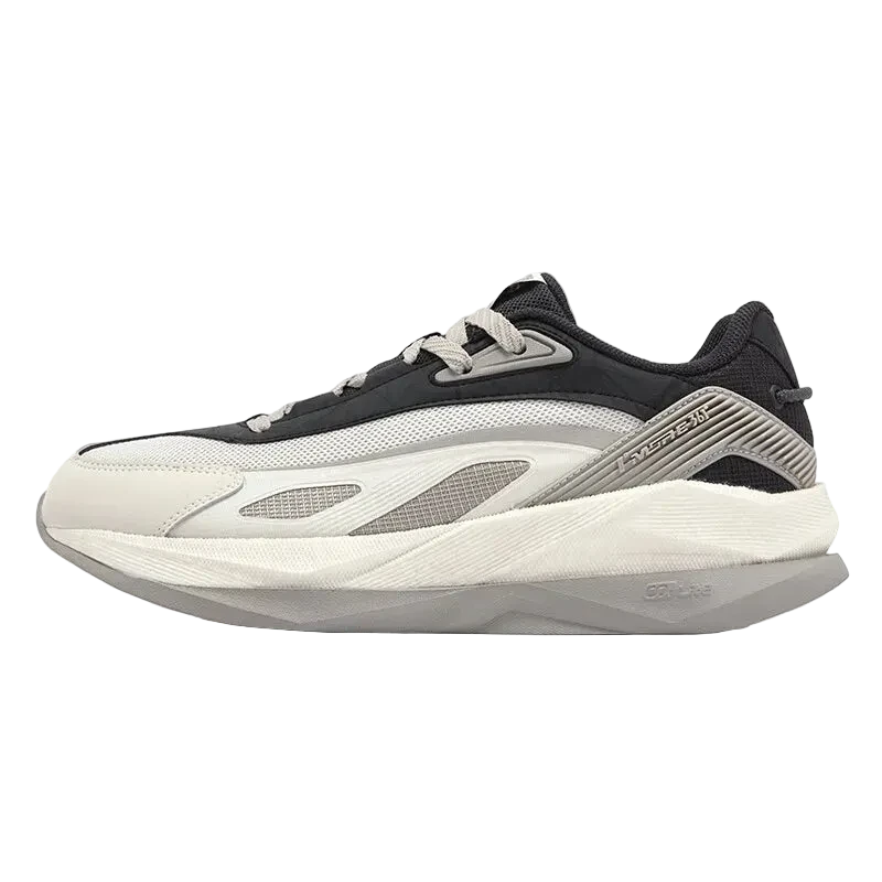 Retro style running sneakers featuring a black and white design, offering comfort and style for everyday wear.